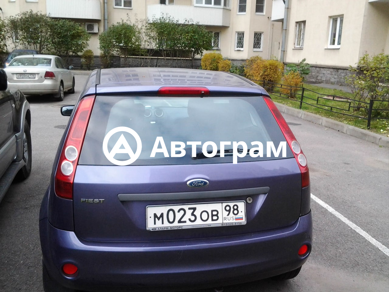 Тс комби. Ford Fiesta 2006 1.4 красный.